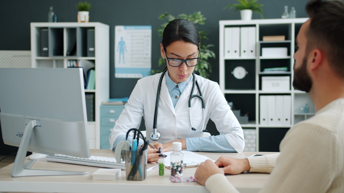 Doctor reviewing a treatment plan with a patient
